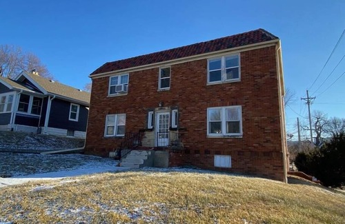 Joslyn Castle Apartment | Cozy Retreat at Classic on Wakeley with Family Amenities