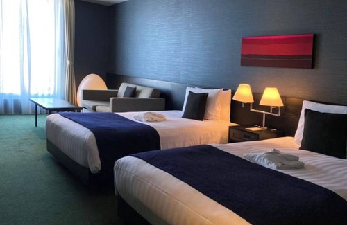 Nishiasakusa Hotel | Classy Twin hotel in welcoming Taito City with AC, fitness room, WiFi