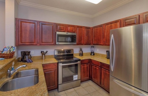 Four Corners Condo | Immaculate Three Bedroom Condo with Pool Near Disney & Golf