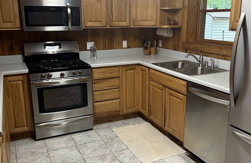 West Branch Cabin | Serene Clear Lake Resort: Cozy Pet-Friendly Cabin Retreat