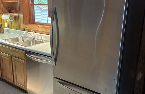 West Branch Cabin | Serene Clear Lake Resort: Cozy Pet-Friendly Cabin Retreat
