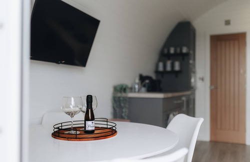 New Moat Cabin | Indulge in Cleddau Glamping Pod with Hot Tub for 4 Guests