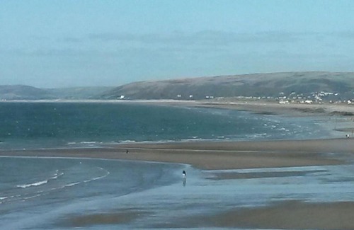 Borth House | Cliff Haven: Oceanfront Retreat with Pet-Friendly Amenities