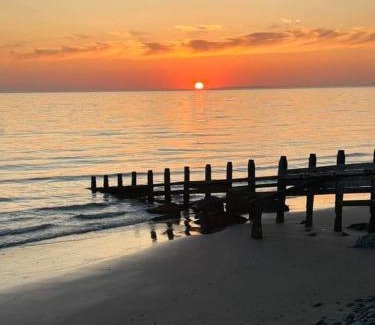 Borth House | Cliff Haven: Oceanfront Retreat with Pet-Friendly Amenities