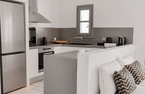 Parikia Villa | Cliff Villa Paros: Panoramic Ocean Views & Shared Pool
