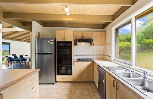 Powlett River House | Seaside Retreat: Enjoy Scenic Views with Spa Amenities