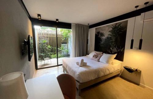 Saint-Denis Apartment | Discover Clos de la Rivière: 4-Star Retreat with Spa & Pool