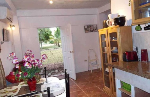 Buccoo Apartment | Perfect Getaway: Near Beaches & Golf with Family-Friendly Amenities