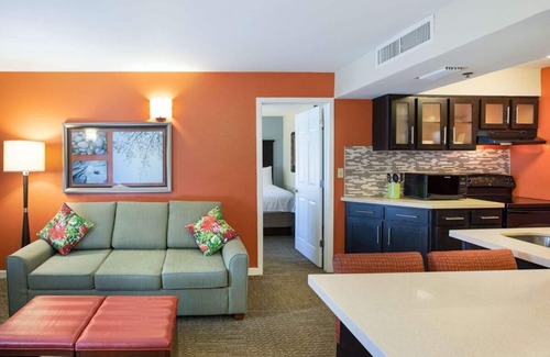 Florida Central Atlantic Coast Hotel | Convenient Suites Near SeaWorld Orlando with Pool & Kitchen