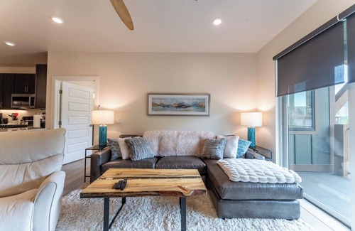 Lakeside Village Condo | Modern 2-Bed Condo with Balcony, Hot Tub & Fireplace