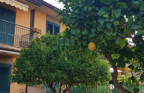 Fondachello Villa | Bright Oceanfront Apartment with Garden Near the Sea