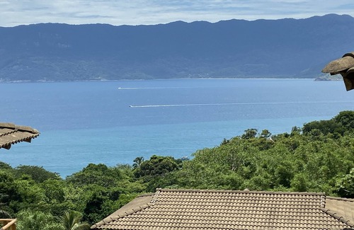 Veloso House | Cozy Beachfront Condominium at Curral, Rated 9.8/10