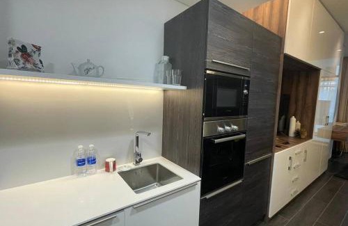 Manama Apartment | Guest Rated 9.8: Cloud9 Waterfront Condo with Pool & Dining