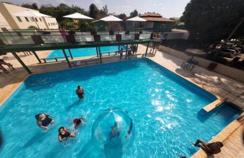 Aguas Lindas de Goias Hotel | Relax at Clube Pousada Chácara da Isabel with Ocean Views