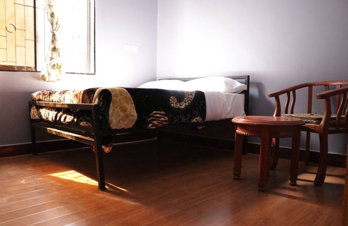 Arusha House | Co Msasani Guest House: Family-Friendly Stay with Dining