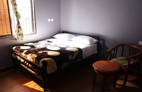 Arusha House | Co Msasani Guest House: Family-Friendly Stay with Dining