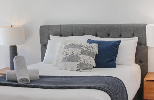 Merimbula Apartment | Coast 21: Poolside Retreat with Family-Friendly Amenities