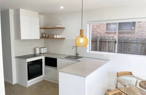 Forster Apartment | Inviting Coast by One Mile with Kitchen Amenities Awaiting You