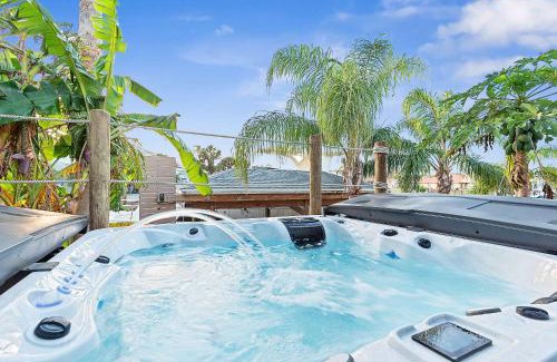 Palm Harbor House | Coastal Canal Front Retreat with Pool & Hot Tub