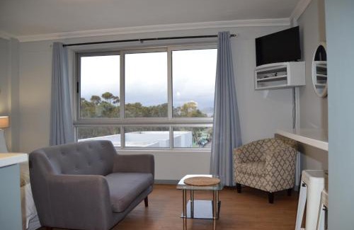 Strand Hotel | Relaxing Coastal Comfort with Oceanfront Views and Pool