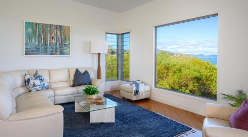Coles Bay House | Oceanfront Coastal Escape with Hot Tub & Fireplace Awaits