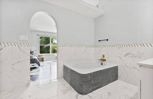 Palm Coast House | Relax at Palm Palace with Heated Pool & Oceanfront Views