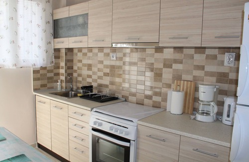 Agioi Anargyroi-Kamatero Apartment | Tranquil Coastal Getaway with Family-Friendly Amenities