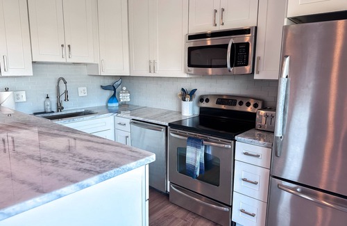Southend House | Pet-Friendly Coastal Soul: Oceanfront Retreat with Spa