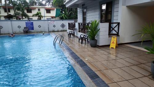 Sernabatim Apartment | Coastal Suites Apart-Hotel: Family-Friendly Ocean Views
