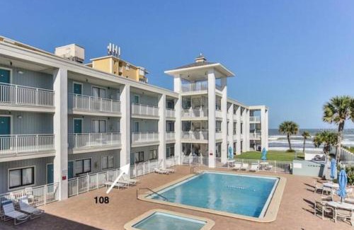 New Smyrna Beach Hotel | Relax at Coastal Waters with Oceanfront Views & Pool Access