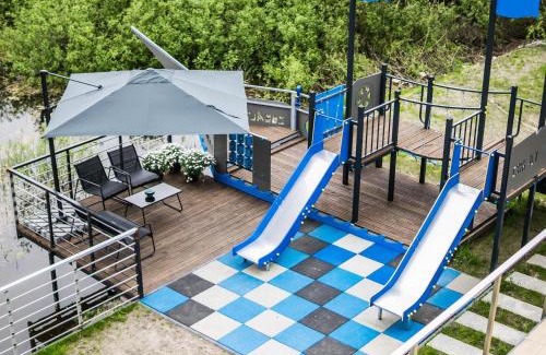 Mikolajki Apartment | Oceanfront Cobalt Apartments with Pool & 9.8/10 Rating
