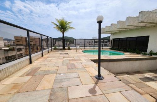 Pitangueiras Apartment | Spacious 5-Bedroom Retreat with Pool Near Pitangueiras