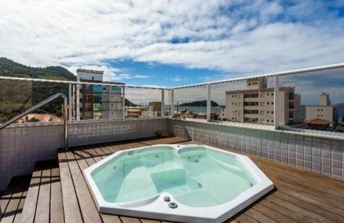Governador Celso Ramos Apartment | Exclusive Cobertura with Private Jacuzzi and Ocean View