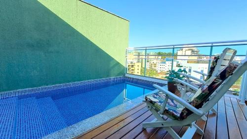 Jardim Sao Miguel Apartment | Relaxing Retreat with Pool at Praia da Enseada