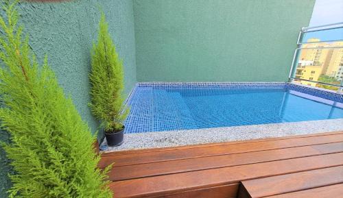 Jardim Sao Miguel Apartment | Relaxing Retreat with Pool at Praia da Enseada