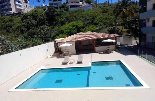 Sao Domingos Apartment | Spacious 3-Bedroom Duplex with Oceanfront Pool in Ilhéus