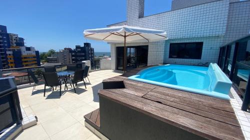 Guaratuba Apartment | Duplex Near the Sea with Pool and Ocean Views