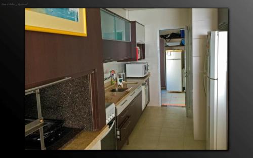 Governador Celso Ramos Apartment | Relax at Cobertura Praia de Palmas with Oceanfront Views