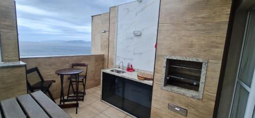 Conceicao de Jacarei Apartment | Oceanfront Escape at Cobertura Porto Real Suítes Mangaratiba