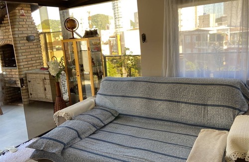 Asturias Apartment | Stylish Triplex with Pool and Oceanfront Views in Guarujá