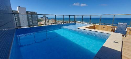 Costa Azul Apartment | Experience Comfort at Smart Costa Azul with Pool Access