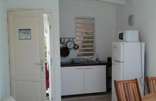 Grand-Bourg Apartment | Experience Coco Beach Resort with Oceanfront Pool Access