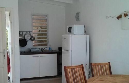 Grand-Bourg Apartment | Experience Coco Beach Resort with Oceanfront Pool Access