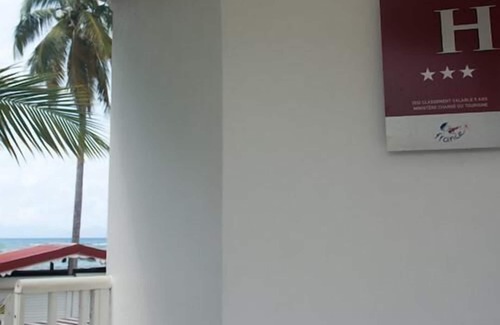 Grand-Bourg Apartment | Experience Coco Beach Resort's Premium Ocean View Retreat