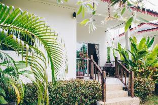 Wok Tum Resort | Guest Rated: Coco Lilly Villas with Oceanfront Pool Access