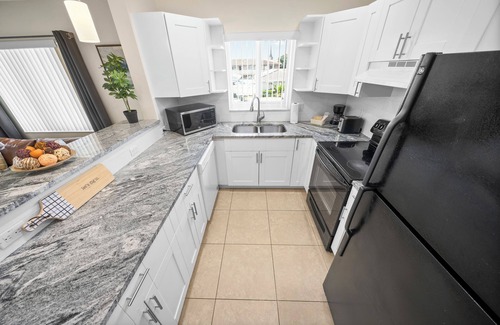Lighthouse Point Apartment | Relaxing Coco Palms Apartments with Spa & Family Amenities