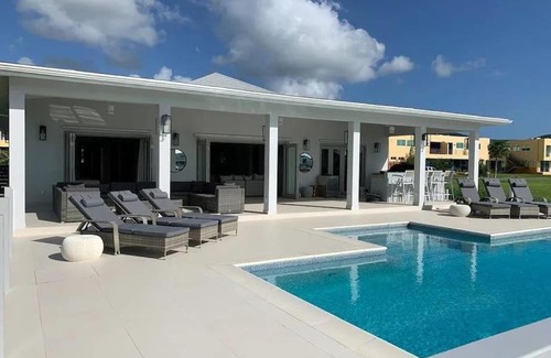 Jolly Harbour Villa | Coco Palms 4 Bedroom Villa with Pool & Dock by the Ocean