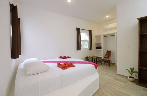 Motul Hotel | Discover Coco Resort: Family-Friendly with Pool & Dining