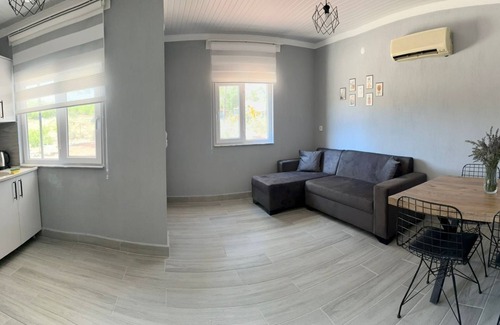 Olympos Apartment | Experience Coconut Apart: Guest Rated 10/10 with Kitchen