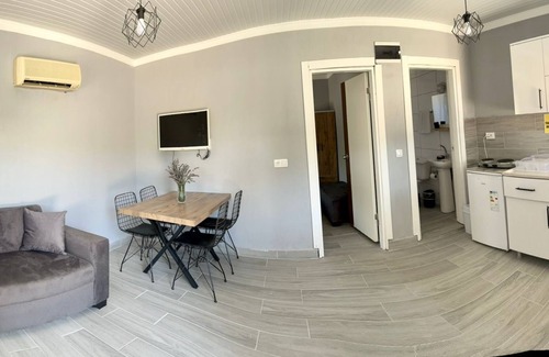 Olympos Apartment | Experience Coconut Apart: Guest Rated 10/10 with Kitchen